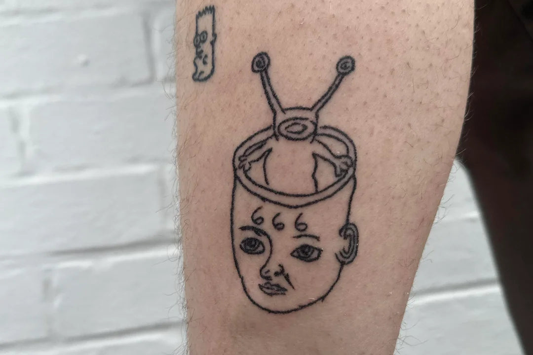 stick and poke tattoo
